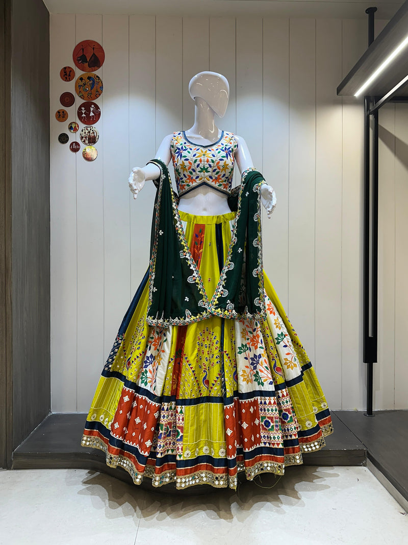 Traditional Navratri wear yellow chaniya choli with green dupatta 