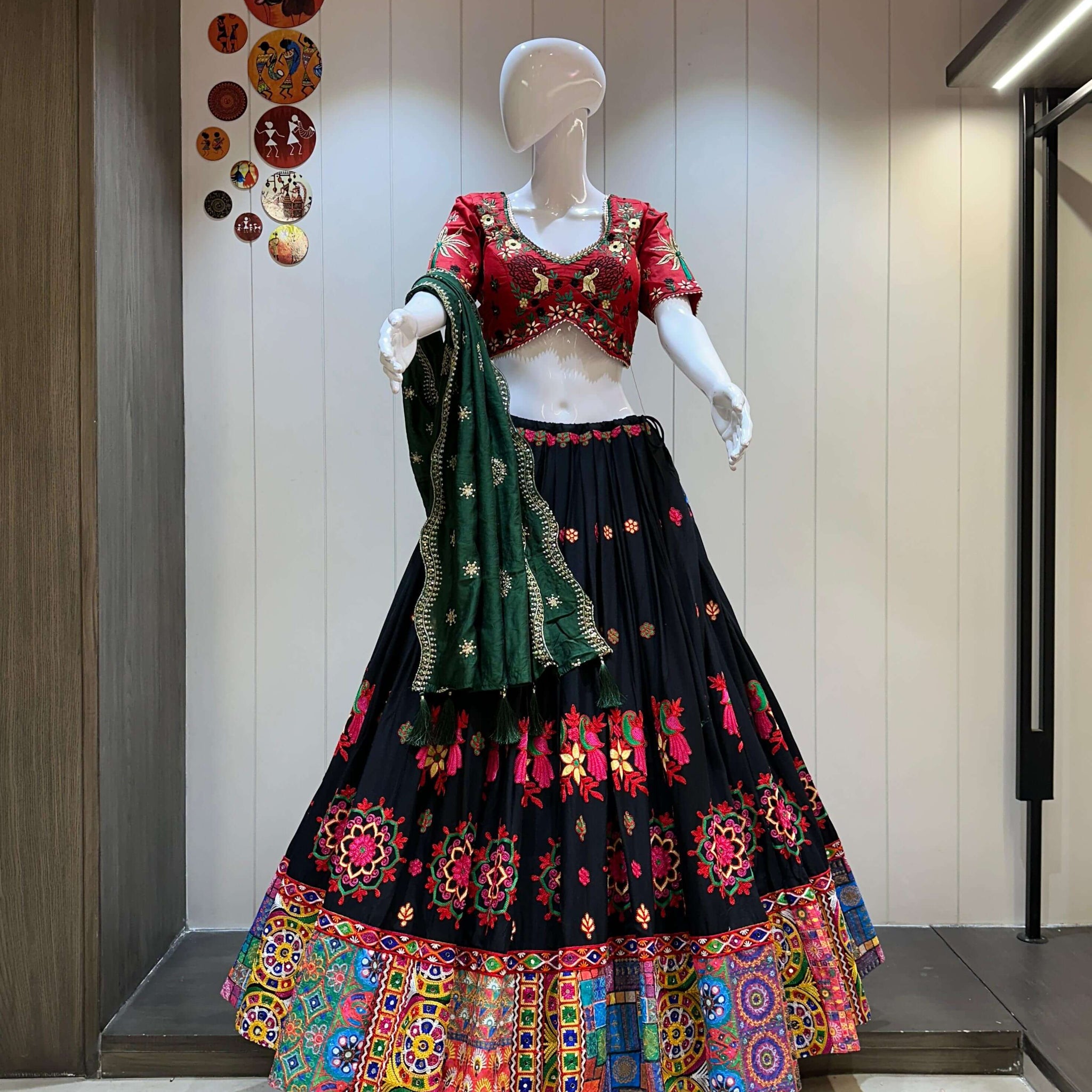 Red blouse black chaniya choli with green dupatta