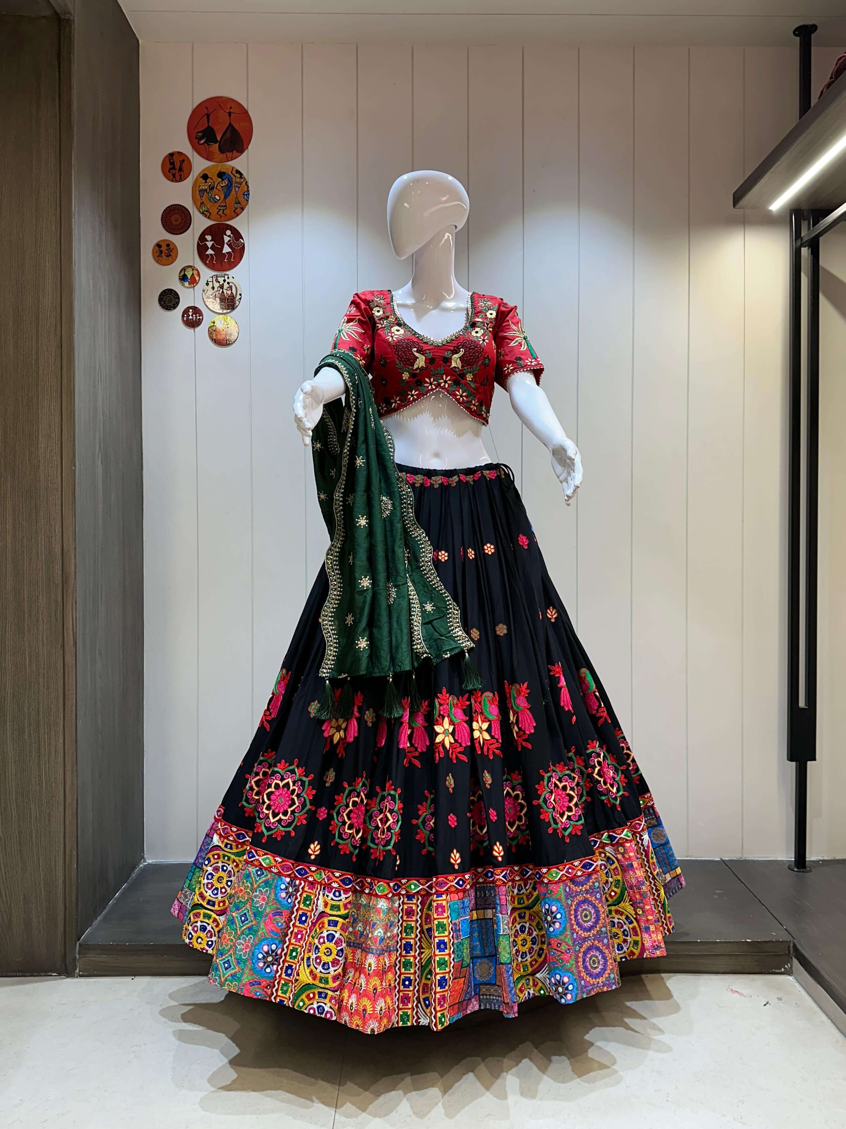 Red blouse black chaniya choli with green dupatta