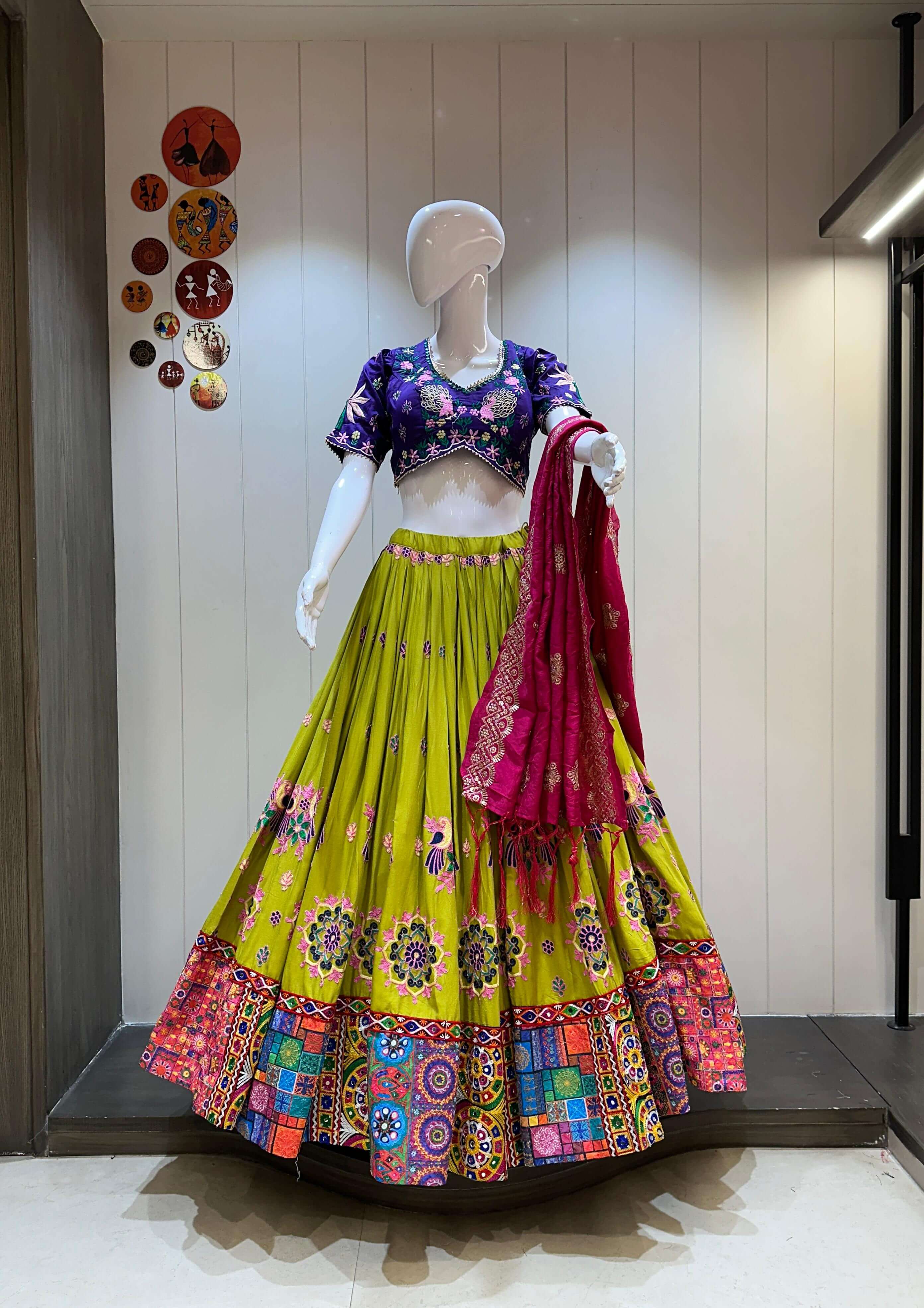 Purple blouse green chaniya choli with pink dupatta