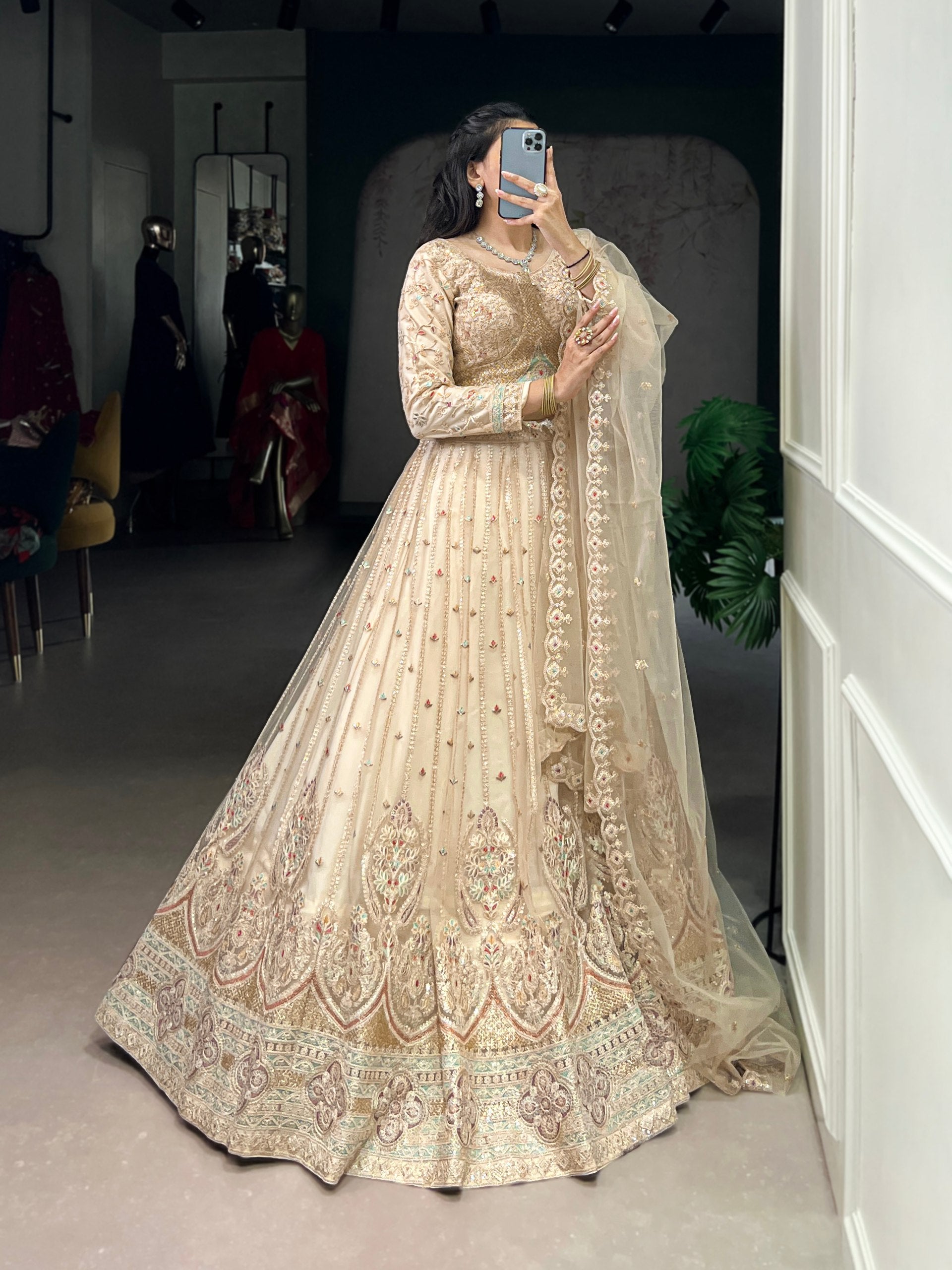 Cream Pure Net Silk Heavy Sequin Embroidery Net Lehenga Choli Net Lehenga Choli Anant Tex Exports Pvt.Ltd..