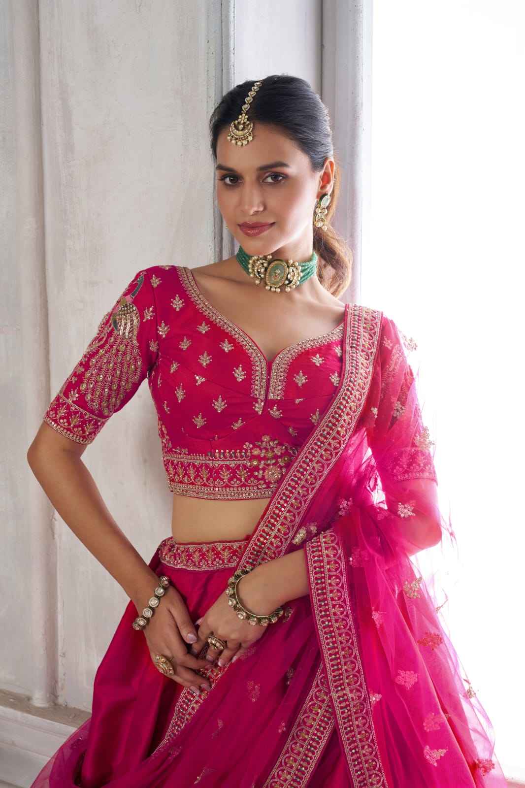 Rani Pink Silk Lehenga Choli with Peacock Zari Embroidery &amp; Net Dupatta