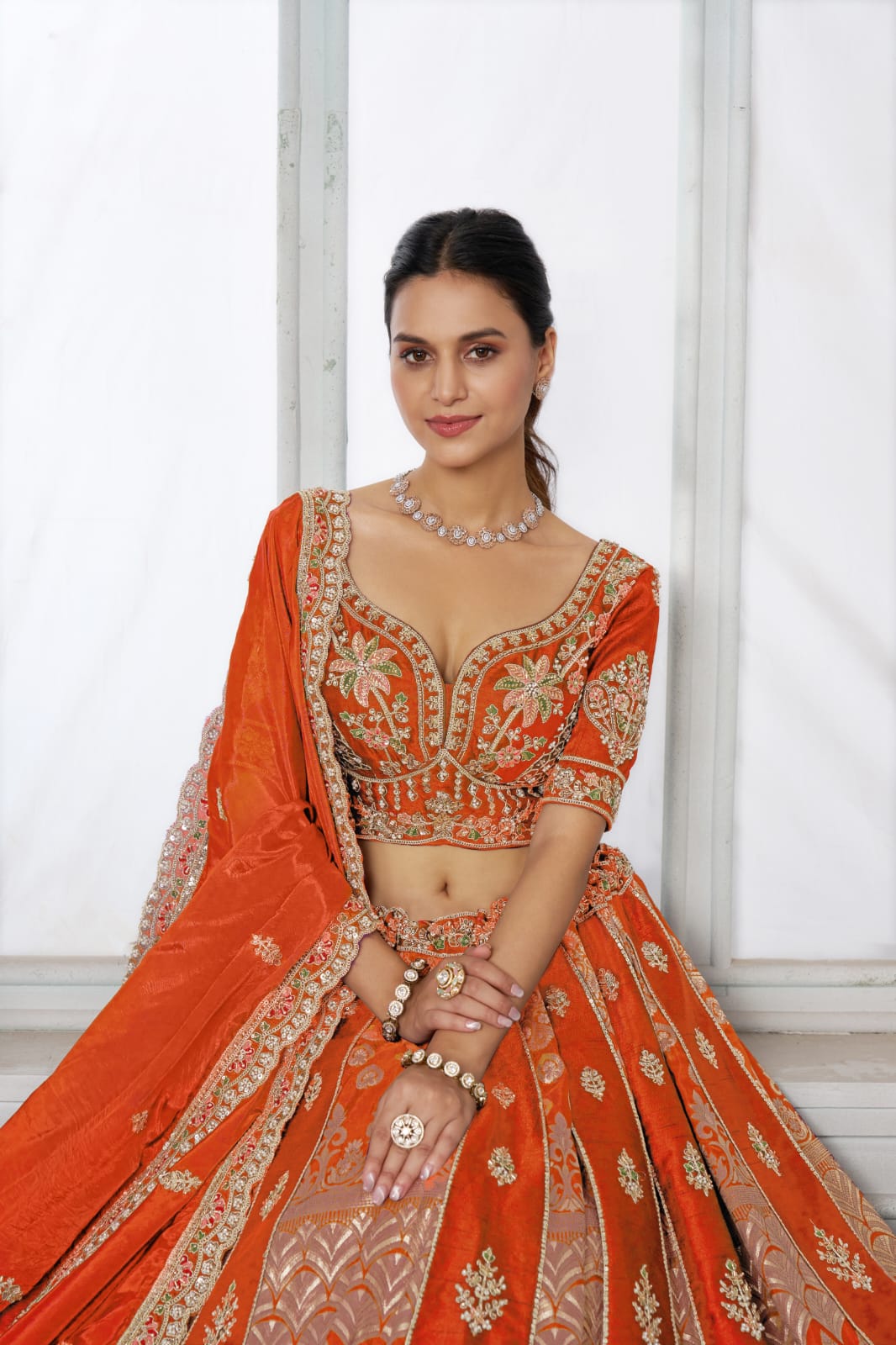 Orange Silk Lehenga Choli with Heavy Embroidery