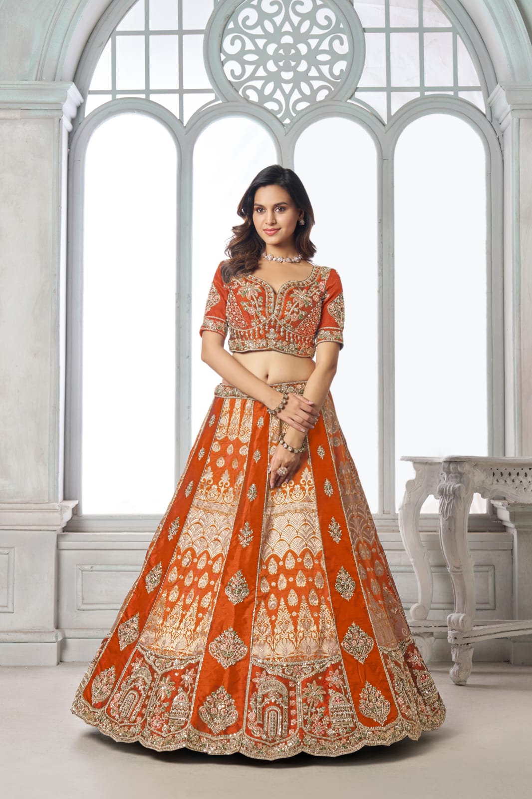 Orange Silk Lehenga Choli with Heavy Embroidery