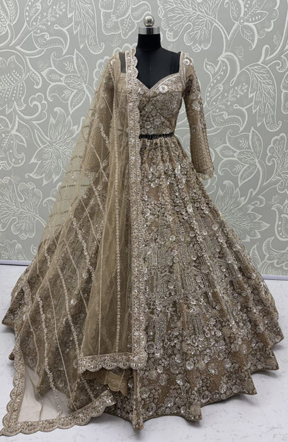 Golden Pure Heavy Net Monochrome Sequins Zari Embroidery Work Net Bridal Lehenga Choli