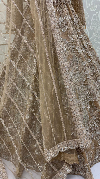 Golden Pure Heavy Net Monochrome Sequins Zari Embroidery Work Net Bridal Lehenga Choli