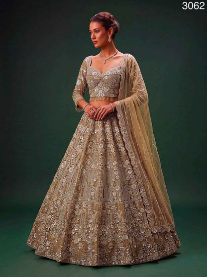 Golden Pure Heavy Net Monochrome Sequins Zari Embroidery Work Net Bridal Lehenga Choli