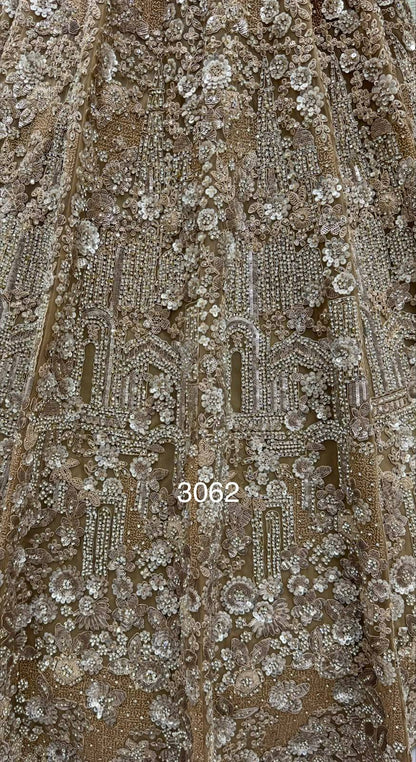 Golden Pure Heavy Net Monochrome Sequins Zari Embroidery Work Net Bridal Lehenga Choli