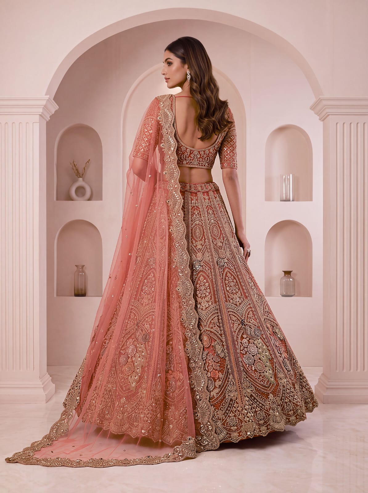 Peach Pure Heavy Net Peacock Pattern Multi Thread Sequins Work Net Bridal Lehenga Choli