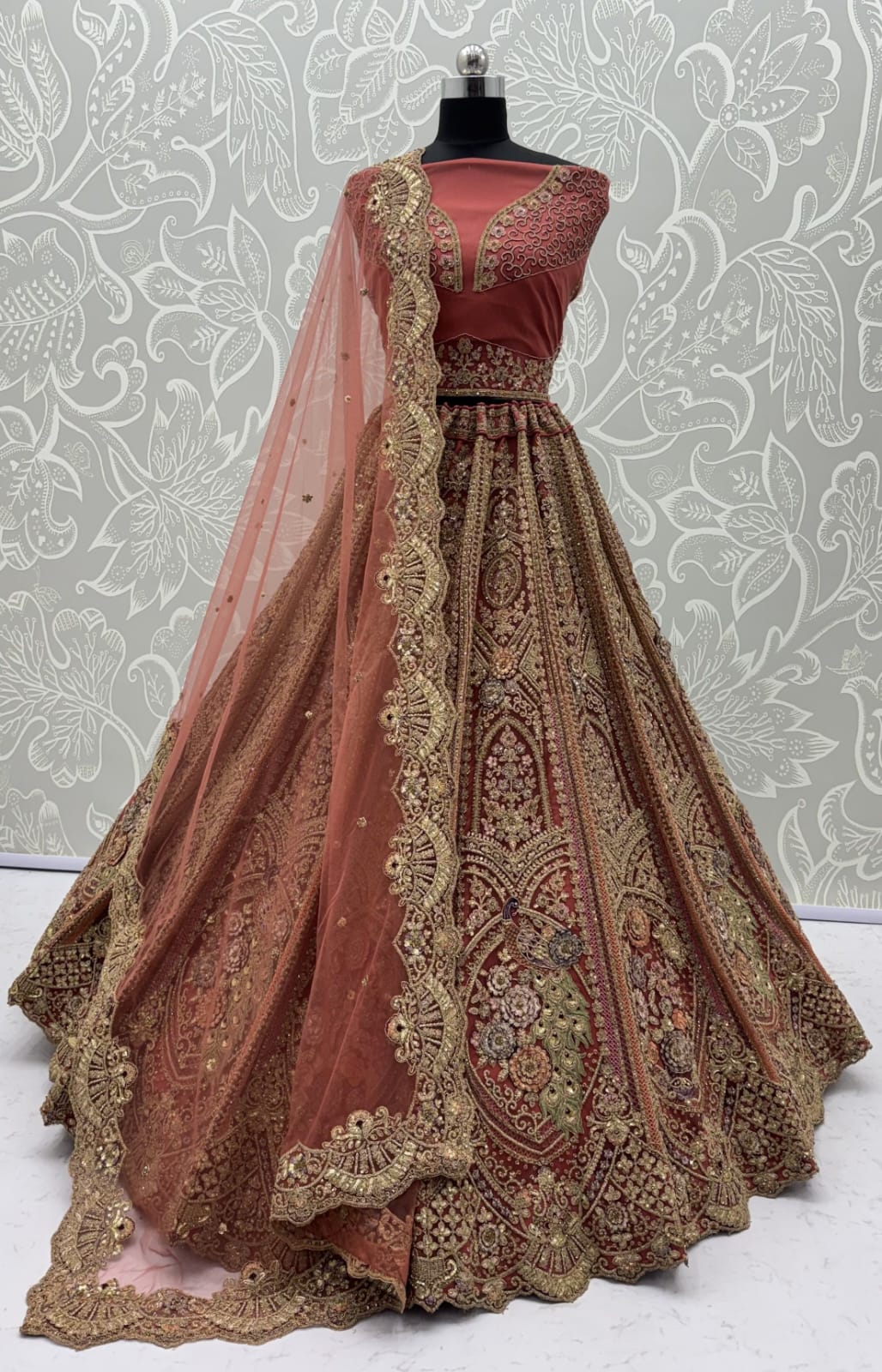 Peach Pure Heavy Net Peacock Pattern Multi Thread Sequins Work Net Bridal Lehenga Choli