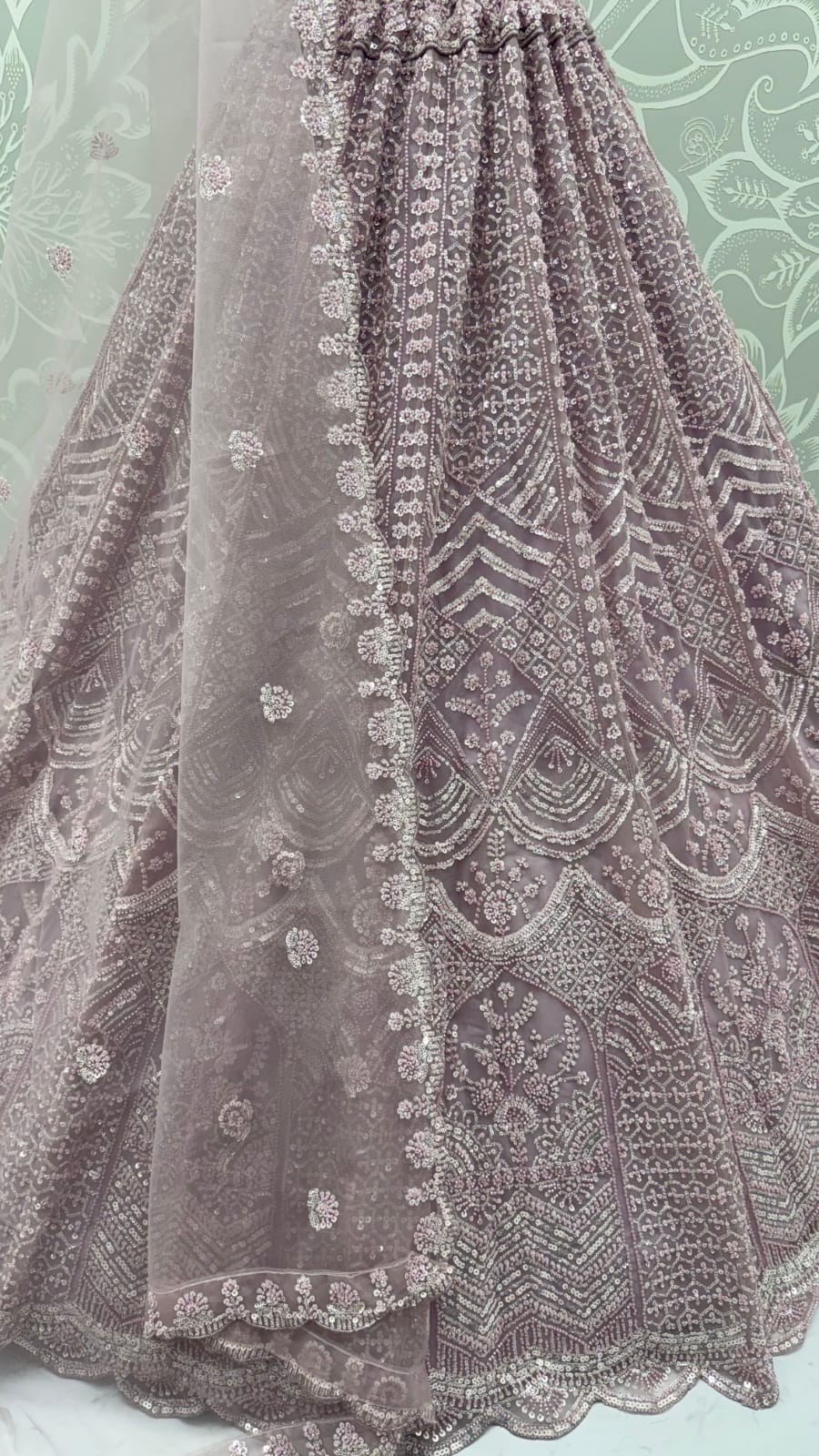 Lavender Pure Heavy Net Motif Handwork Zari Sequins Work Bridal Lehenga Choli