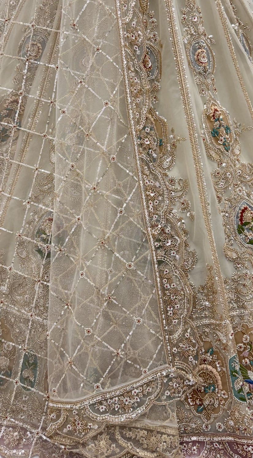 Cream Pure Heavy Net Motif Handwork Zari Sequins Work Bridal Lehenga Choli
