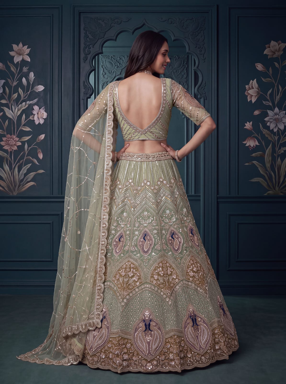Pista Pure Heavy Net Motif Handwork Zari Sequins Work Bridal Lehenga Choli
