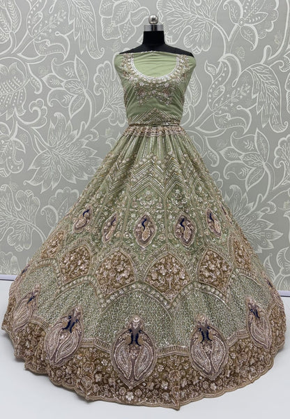 Pista Pure Heavy Net Motif Handwork Zari Sequins Work Bridal Lehenga Choli