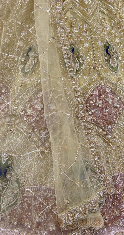 Beige Pure Heavy Net Motif Handwork Zari Sequins Work Bridal Lehenga Choli