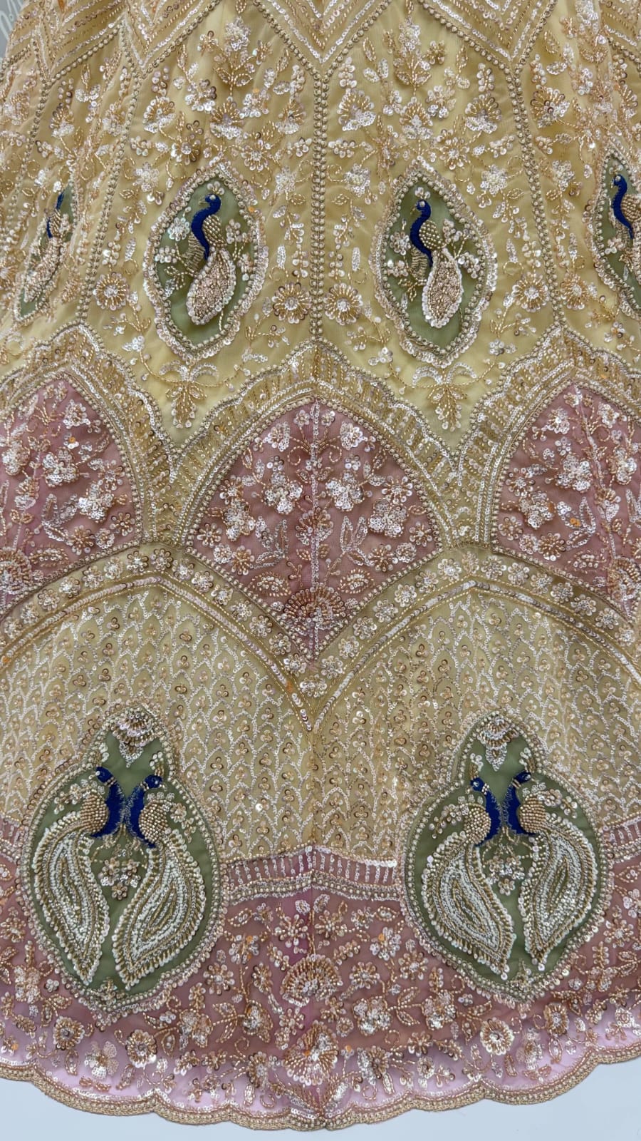 Beige Pure Heavy Net Motif Handwork Zari Sequins Work Bridal Lehenga Choli