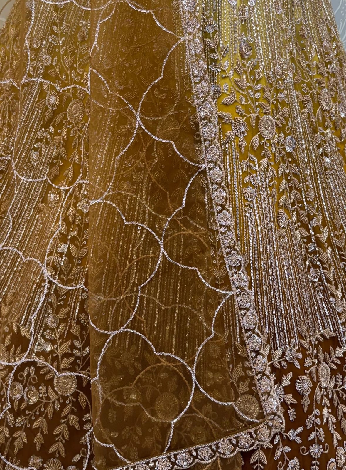 Gold Pure Heavy Net Motif Handwork Zari Sequins Work Bridal Lehenga Choli