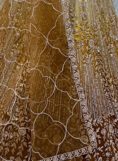 Gold Pure Heavy Net Motif Handwork Zari Sequins Work Bridal Lehenga Choli