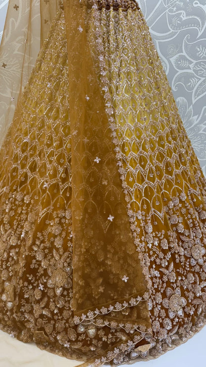 Gold Pure Heavy Net Motif Handwork Zari Sequins Work Bridal Lehenga Choli