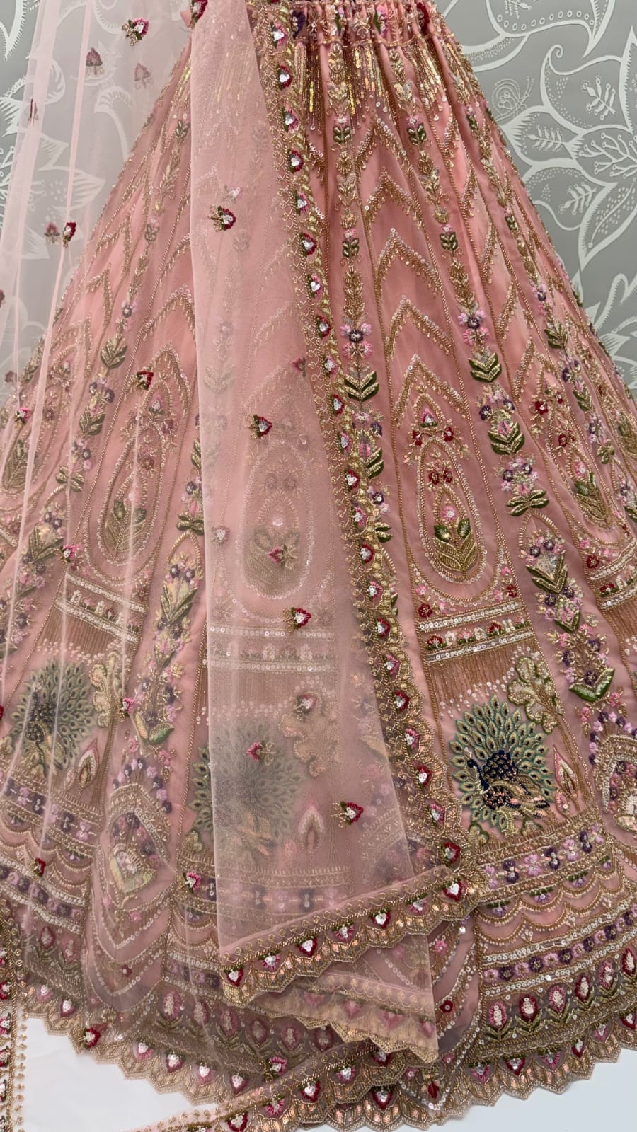 Peach Pure Heavy Net Motif Handwork Zari Sequins Work Bridal Lehenga Choli