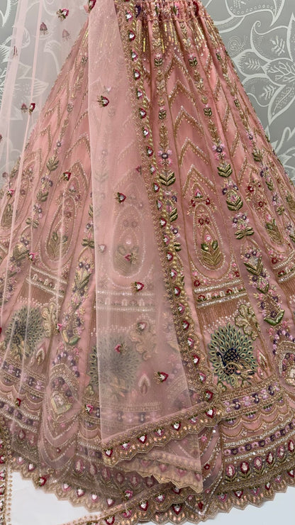 Peach Pure Heavy Net Motif Handwork Zari Sequins Work Bridal Lehenga Choli