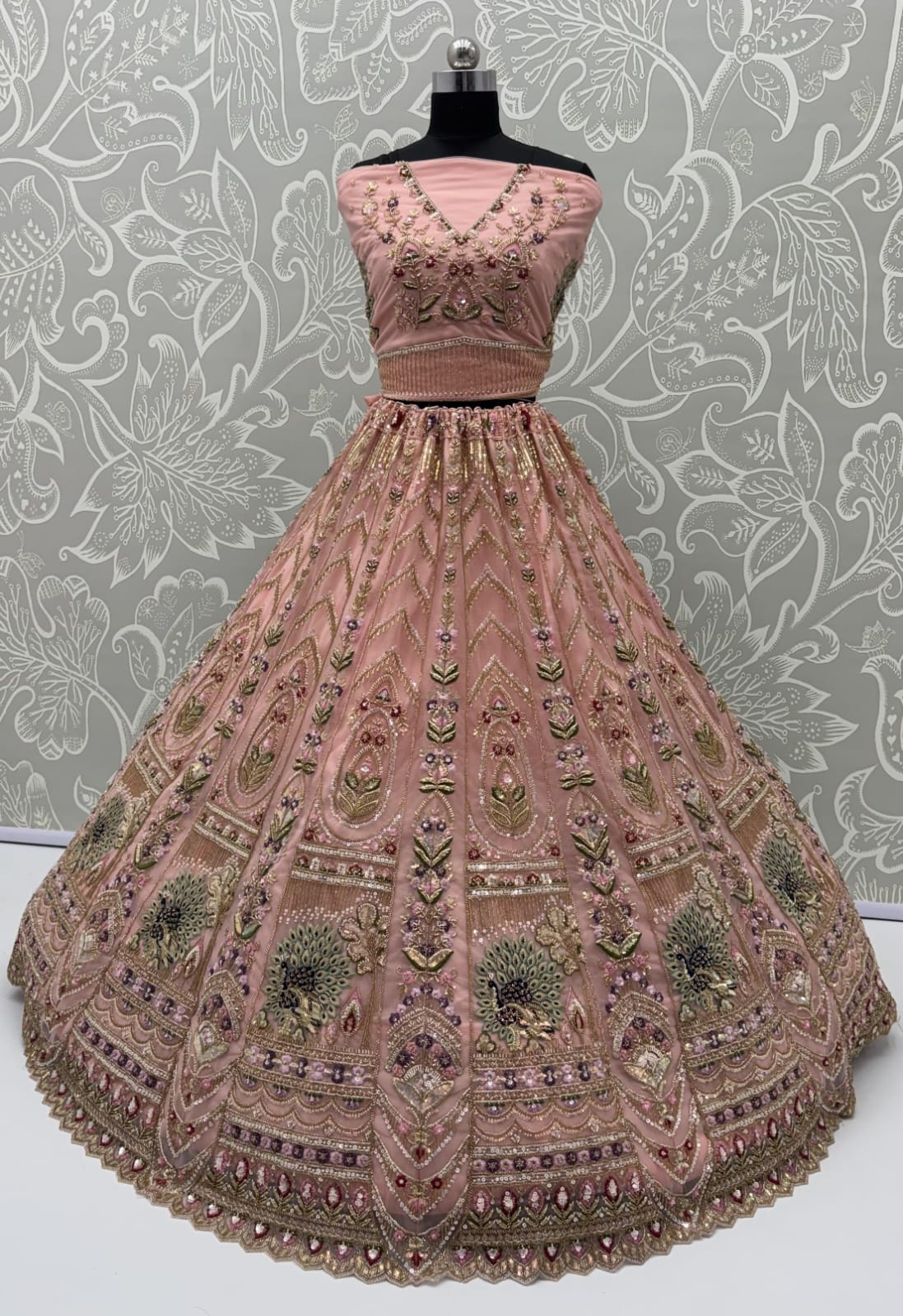 Peach Pure Heavy Net Motif Handwork Zari Sequins Work Bridal Lehenga Choli