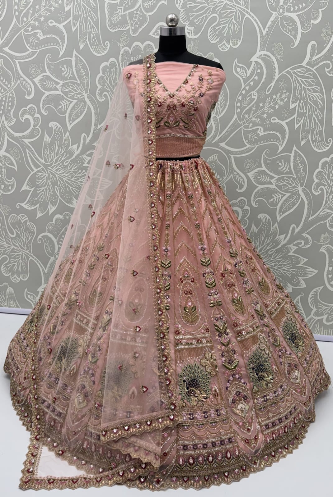 Peach Pure Heavy Net Motif Handwork Zari Sequins Work Bridal Lehenga Choli
