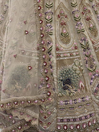 Chiku Pure Heavy Net Motif Handwork Zari Sequins Work Bridal Lehenga Choli