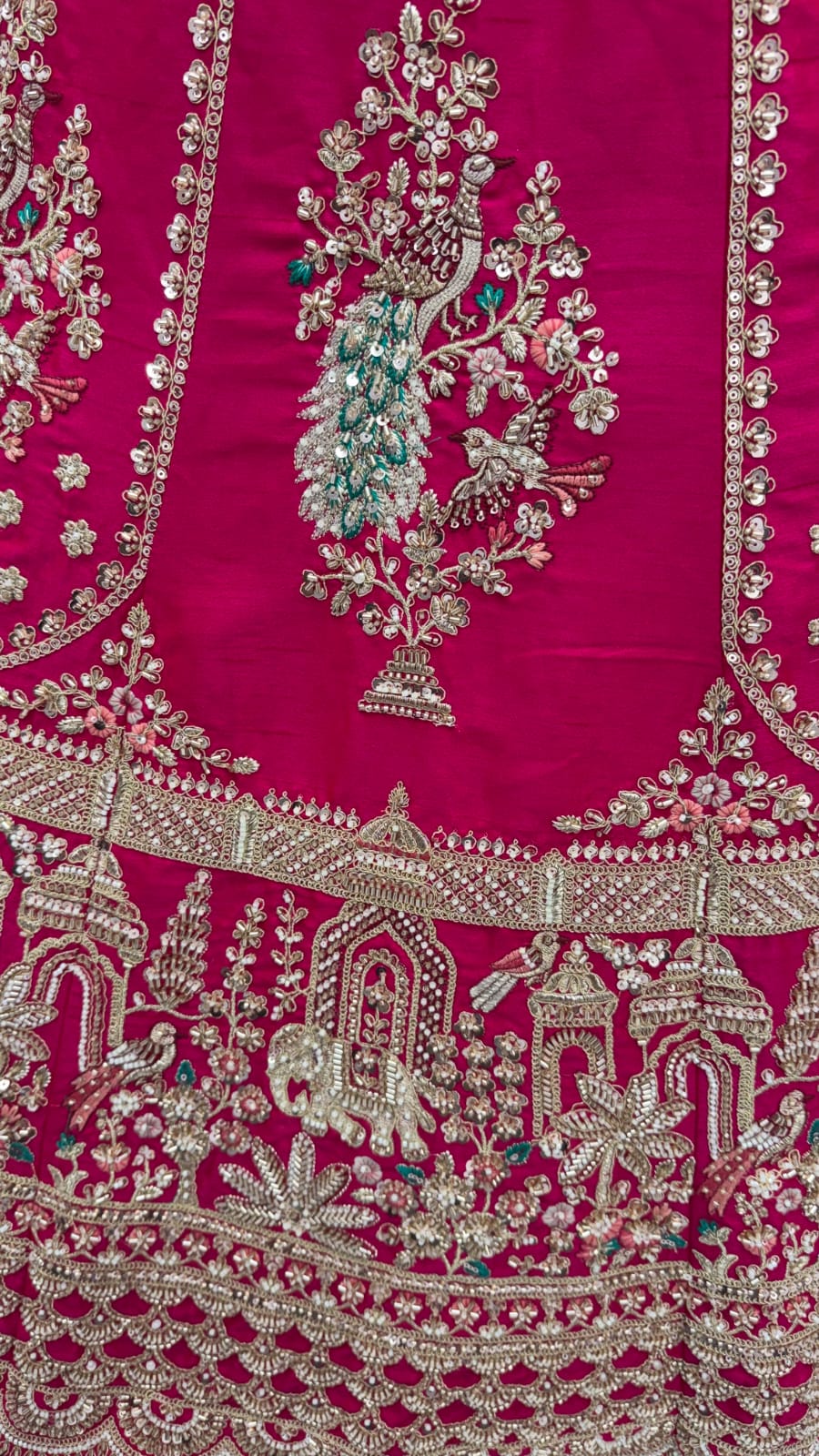 Rani Pink Pure Gadhwal Silk Peacock Pattern Handwork Motif Sequins Work Bridal Lehenga Choli