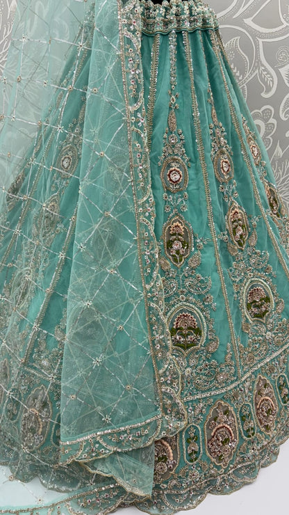 Pista Pure Premium Net Handwork Motif Crystal Patch Multi Thread &amp; Sequins Work Bridal Lehenga Choli