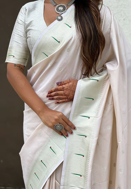 Pearl White Pastel Zari Woven Peacock Lotus Paithani Silk Saree Paithani Saree Anant Tex Exports Pvt.Ltd..
