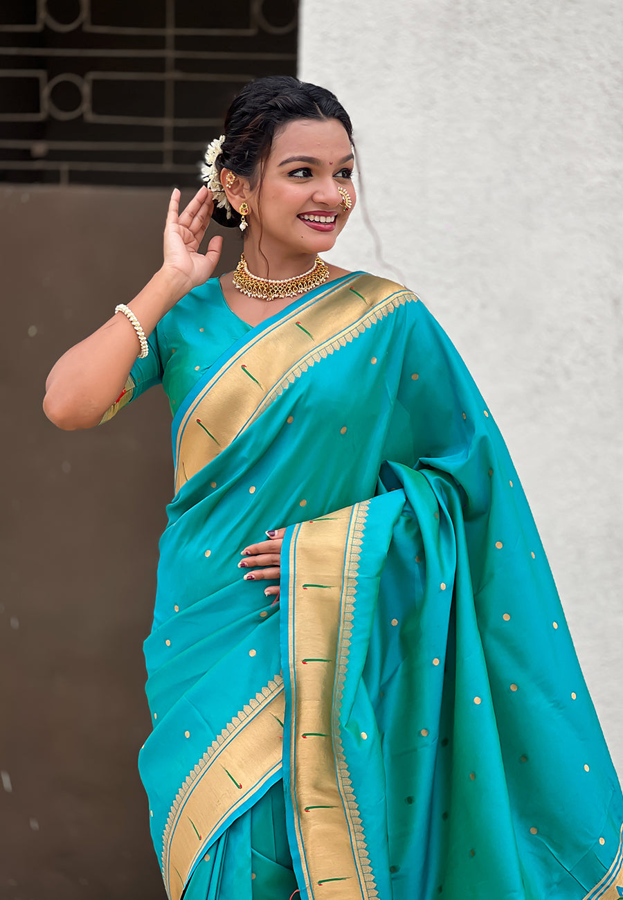 Aqua Blue Zari Woven Mahalaxmi God Paithani Silk Saree Paithani Saree Anant Tex Exports Pvt.Ltd..