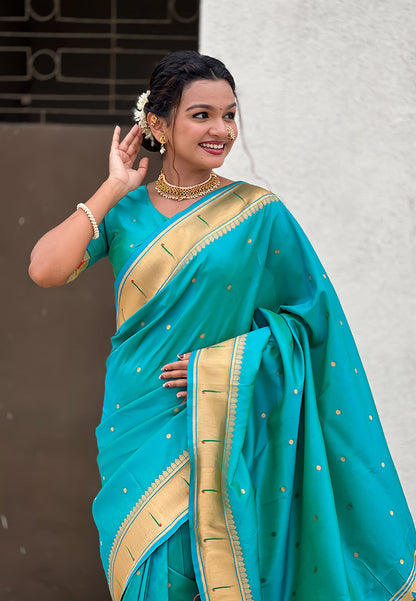 Aqua Blue Zari Woven Mahalaxmi God Paithani Silk Saree Paithani Saree Anant Tex Exports Pvt.Ltd..