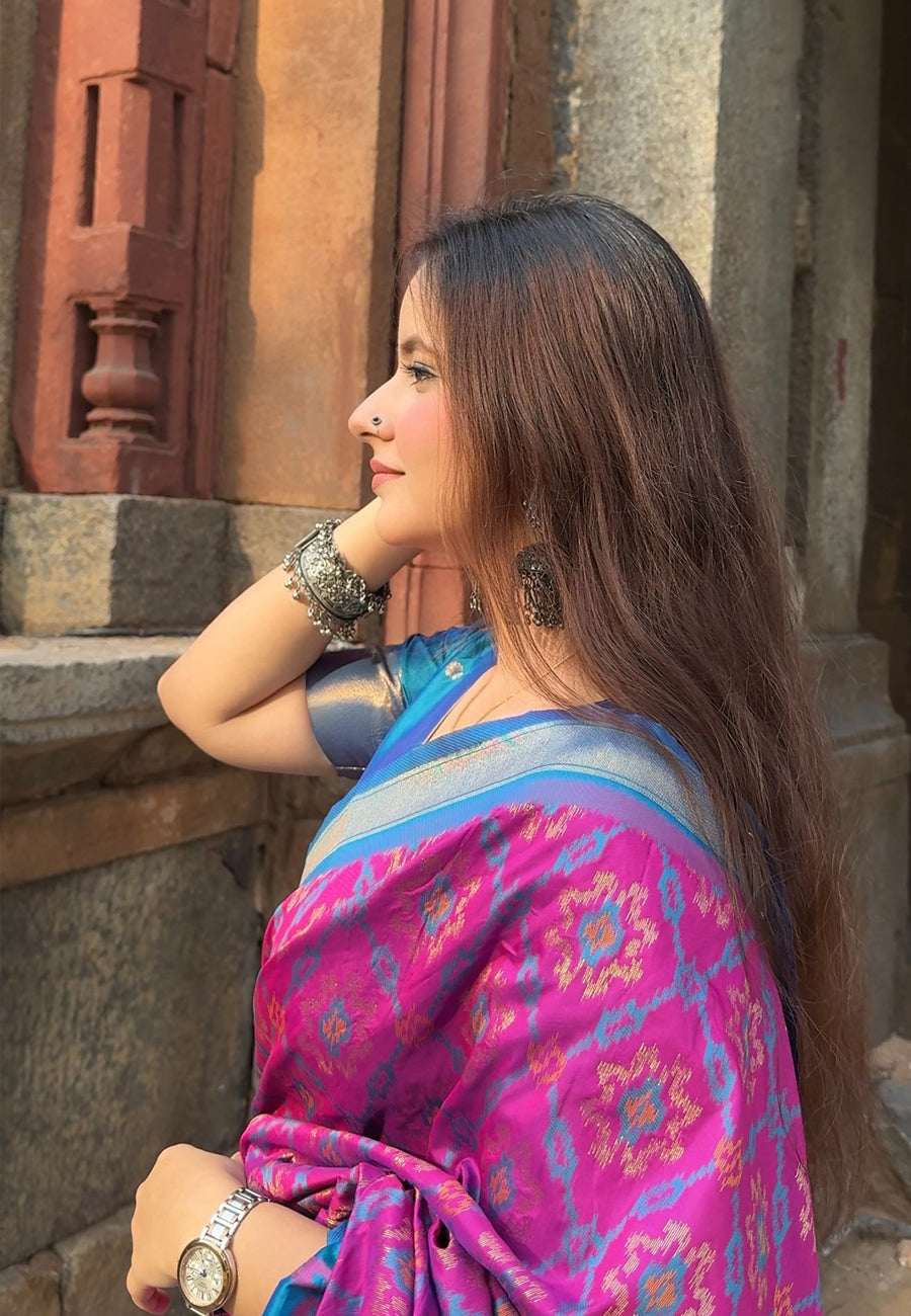 Himanshi in our Wine Soft Silk Zari Woven Patola Saree