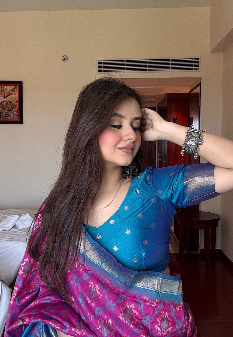 Himanshi in our Wine Soft Silk Zari Woven Patola Saree