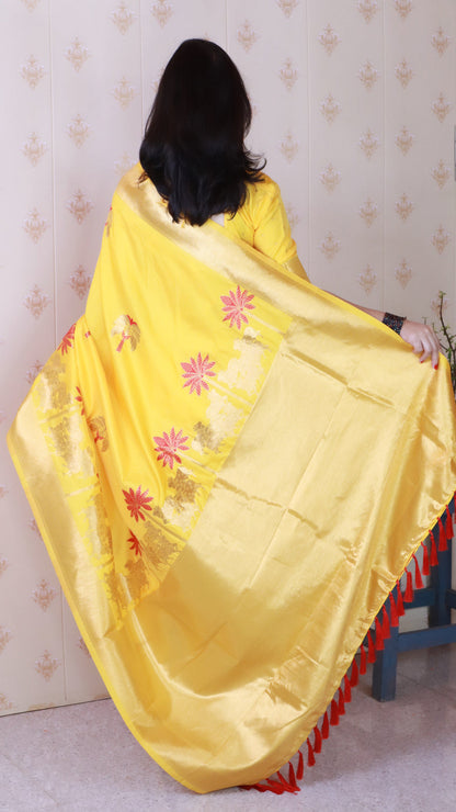 Bright Yellow Soft Silk with Kamdhenu Weaves Zari Woven Saree
