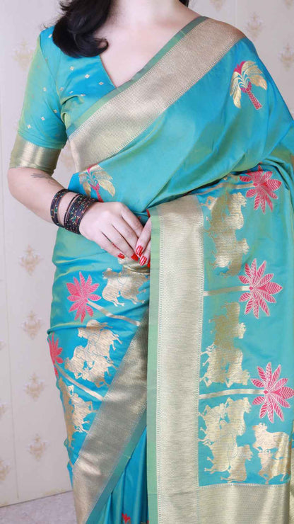 Aqua Blue Soft Silk with Kamdhenu Weaves Zari Woven Saree
