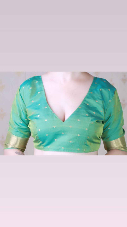 Green Soft Silk with Kamdhenu Weaves Zari Woven Saree