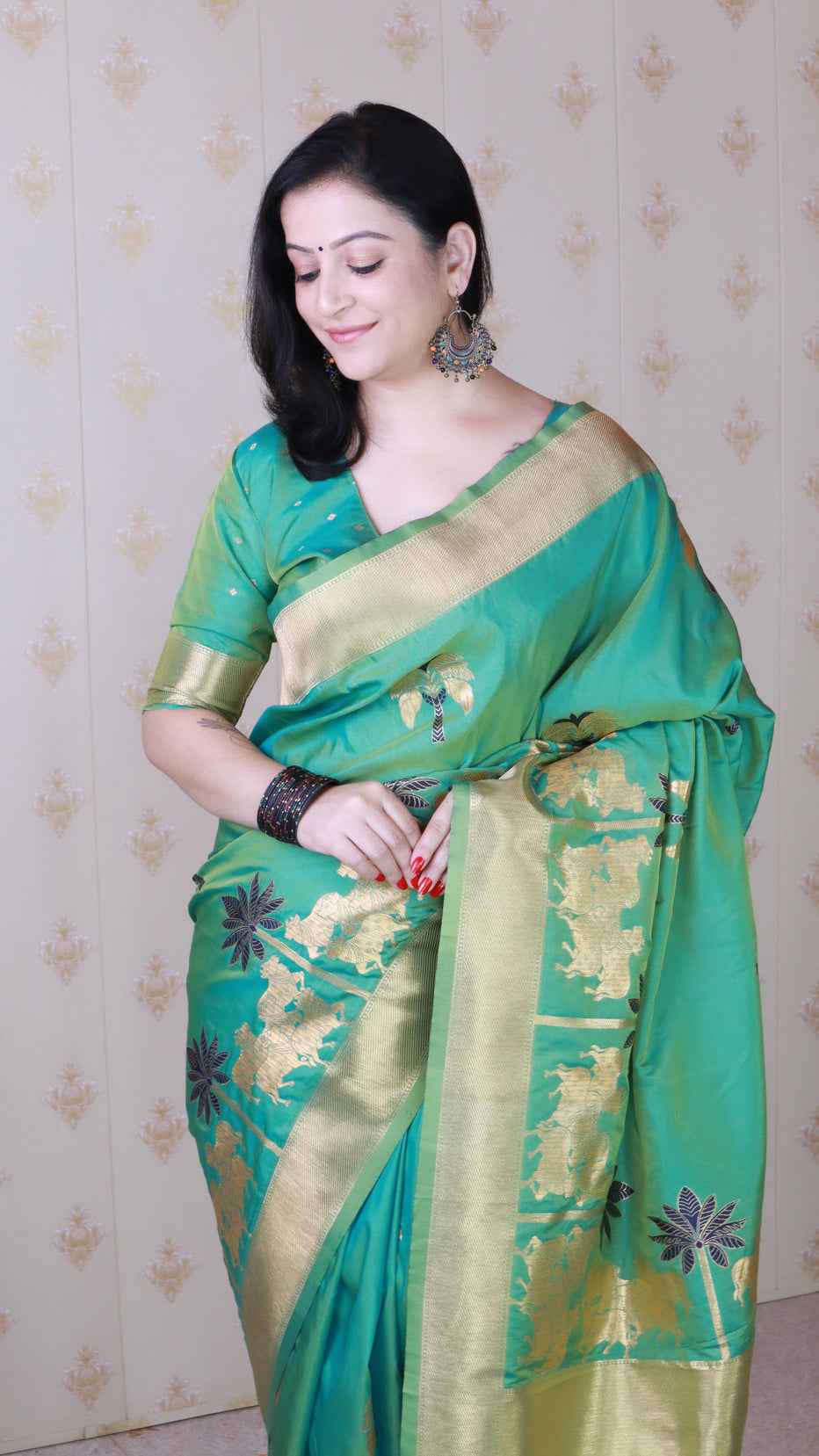 Green Soft Silk with Kamdhenu Weaves Zari Woven Saree