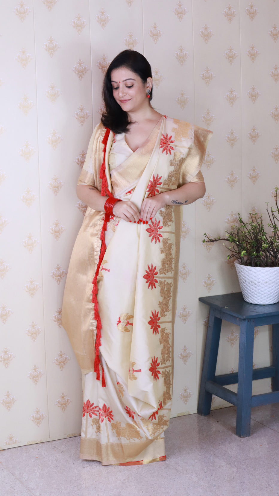 Cream Soft Silk with Kamdhenu Weaves Zari Woven Saree