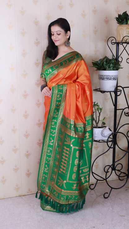 Orange Soft Silk Zari Woven Warli Art Soft Silk Saree Banarasi Saree Anant Tex Exports Pvt.Ltd..