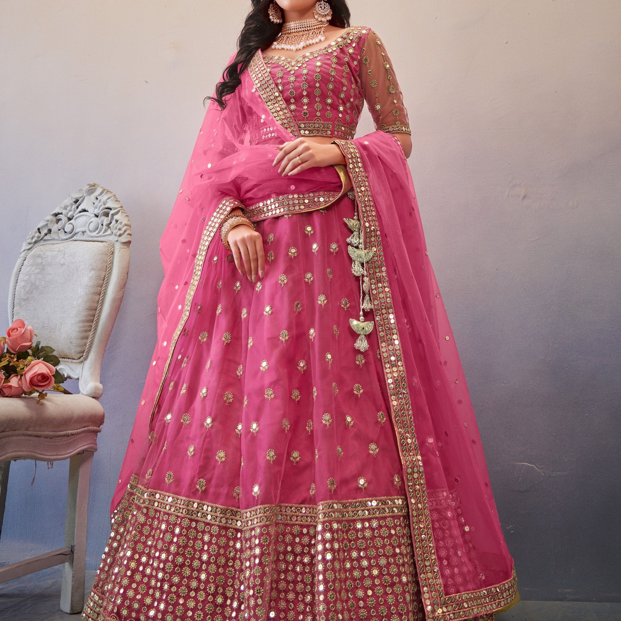 Dark Pink Heavy Embroidered Bridal Lehenga Choli with intricate detailing and matching dupatta