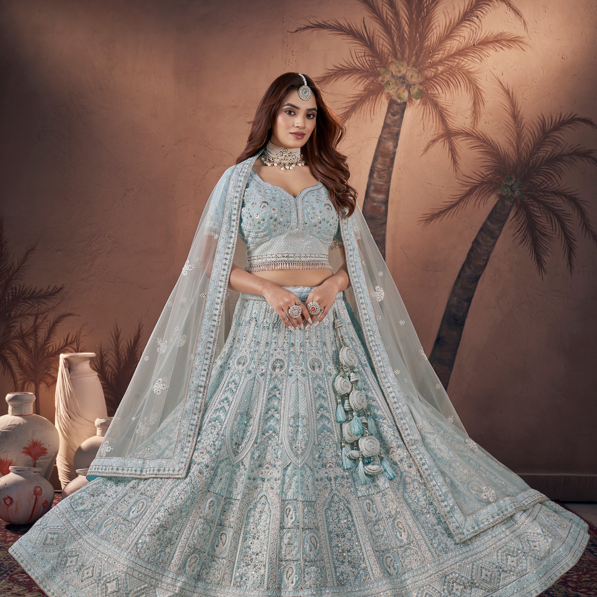 Ice blue bridal lehenga with full zarkan handwork and net dupatta
