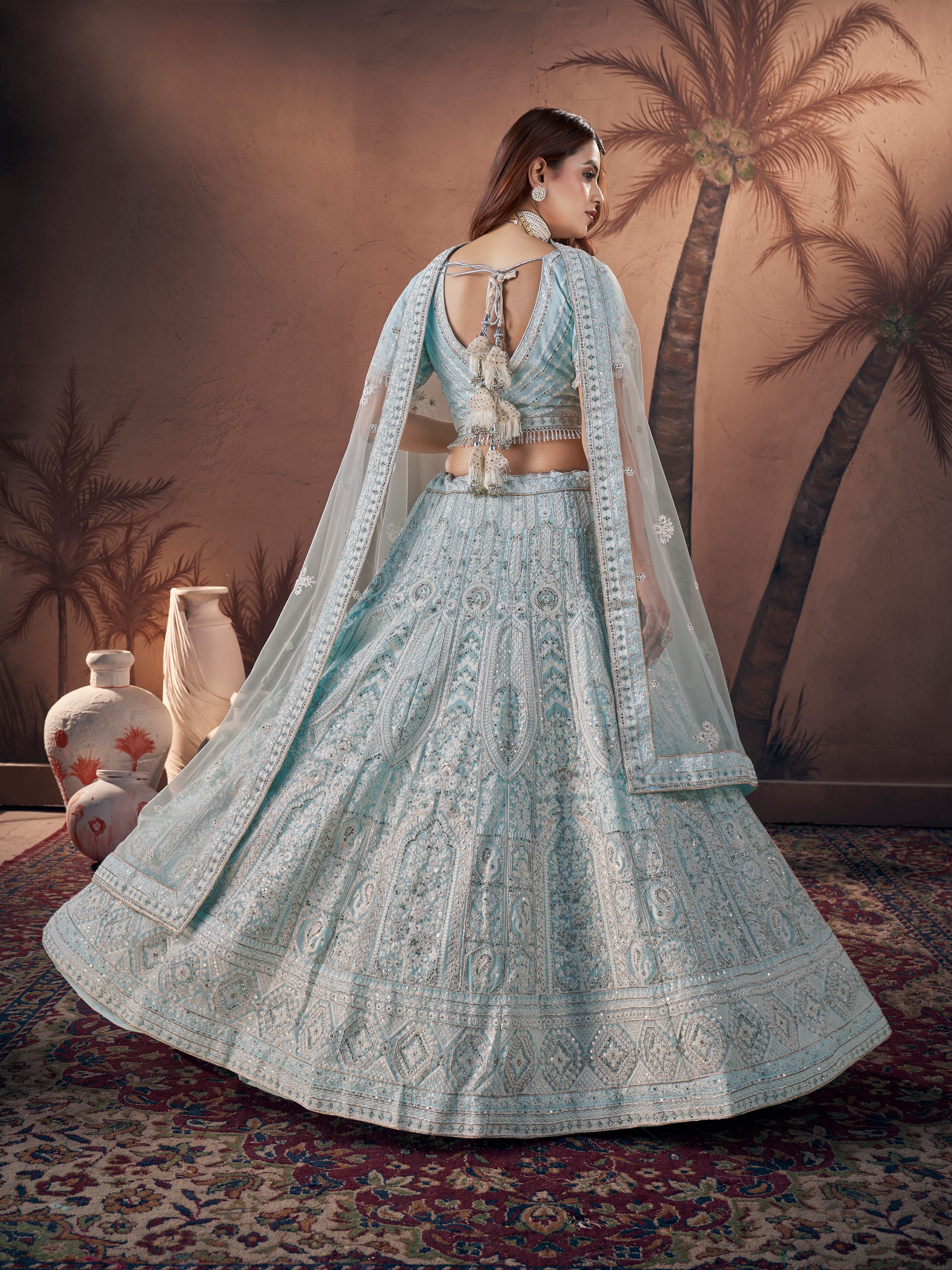 Premium handwork bridal lehenga in georgette with silver zarkan embellishments