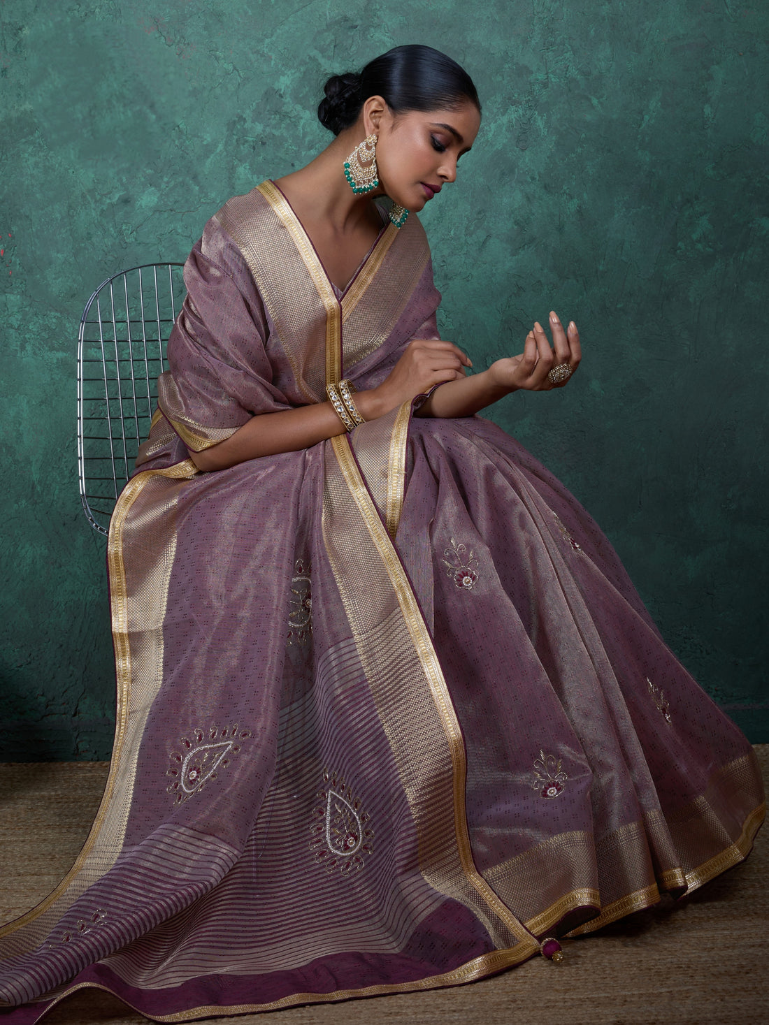 Mauve tissue linen saree with golden lace and tassels