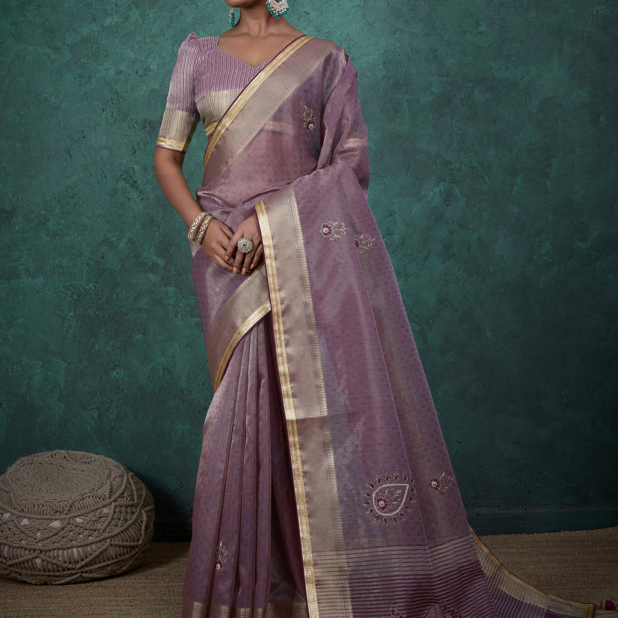 Mauve tissue linen saree with golden lace and tassels