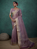 Mauve tissue linen saree with golden lace and tassels