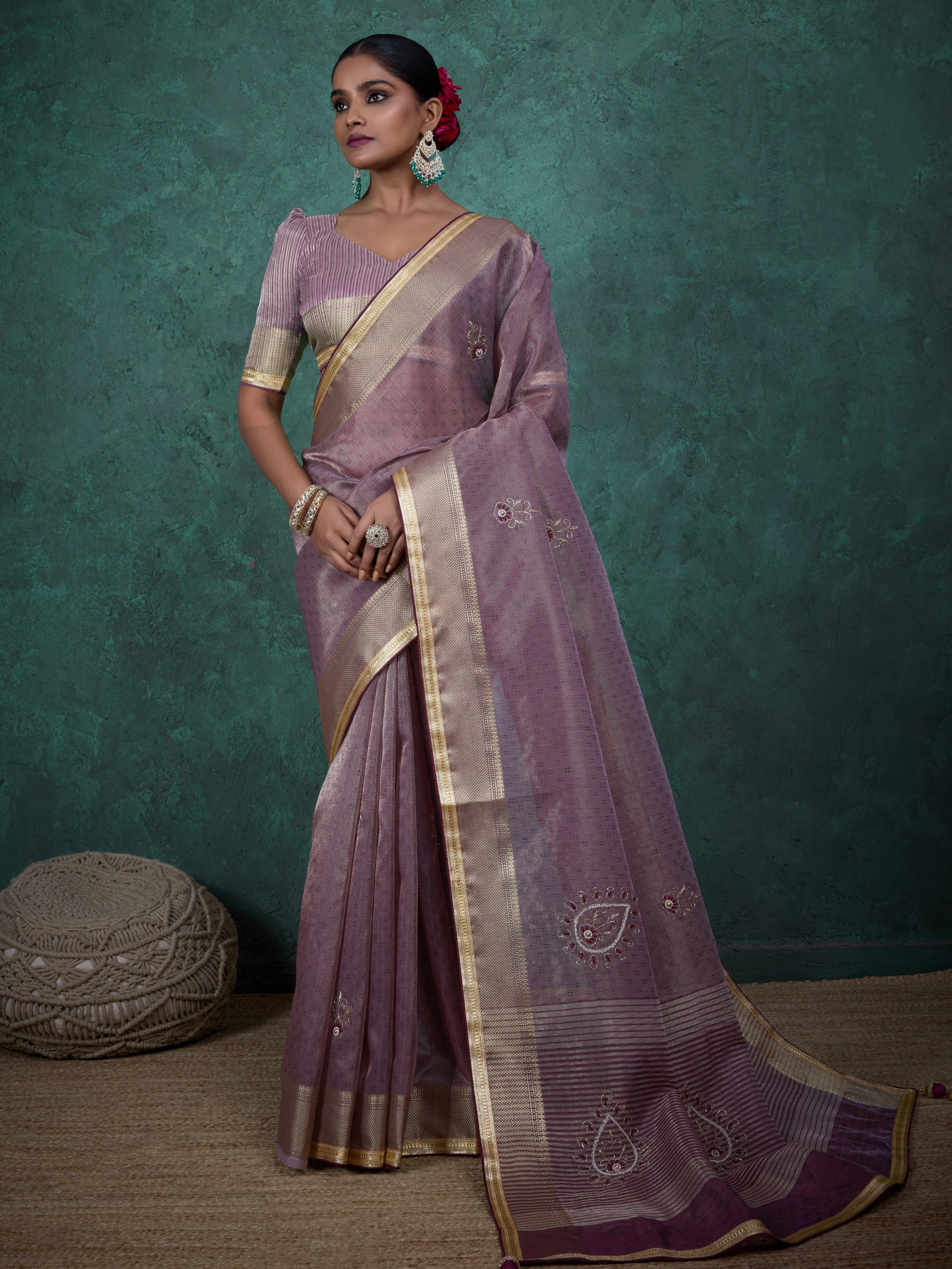 Mauve tissue linen saree with golden lace and tassels