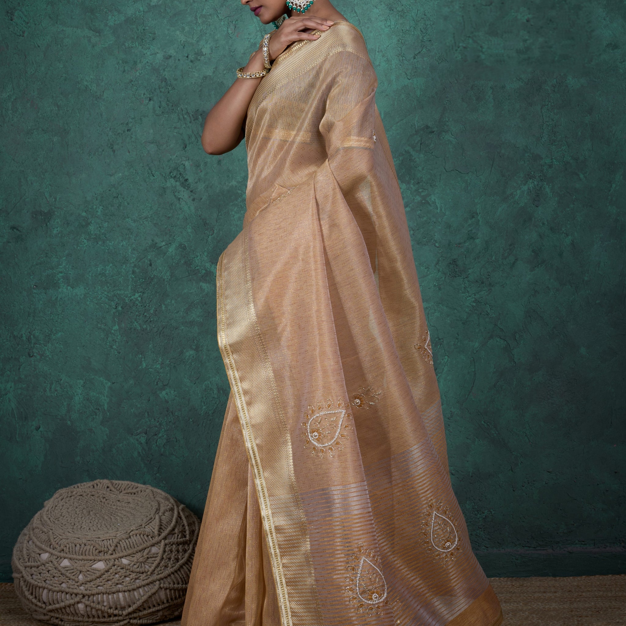 Beige gold tissue linen saree with elegant embroidery