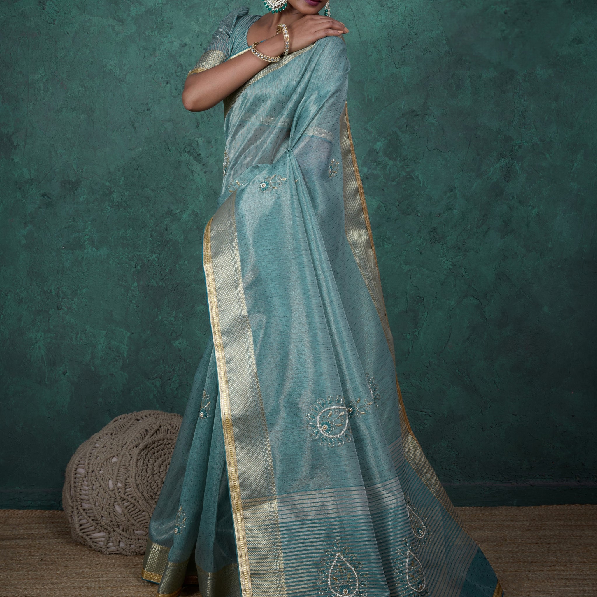 Aqua blue saree in jacquard linen with hand embroidery